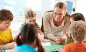 a teacher with her students at school