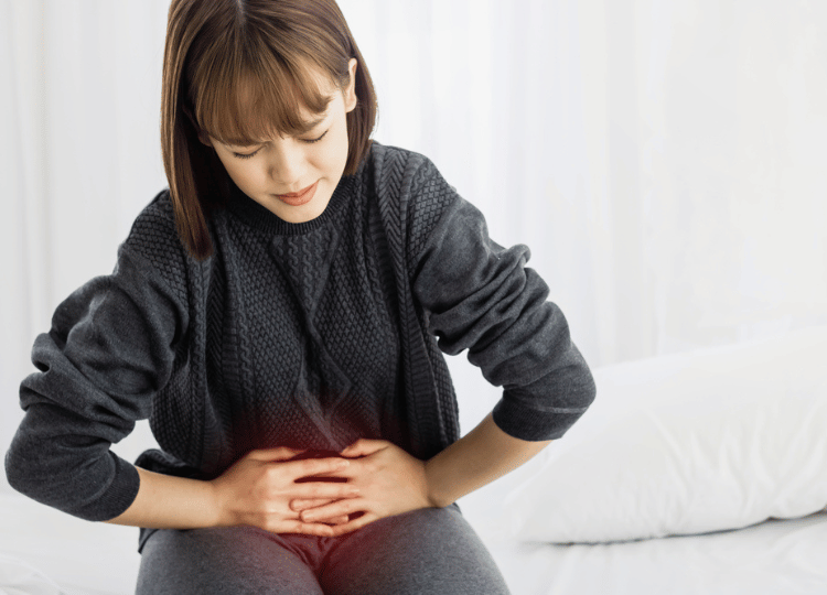 a woman suffering from ulcer